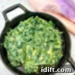 Velvet Mascarpone Spinach Your Ultimate Creamy Side 11 Creamed Spinach with Mascarpone in a black dish.