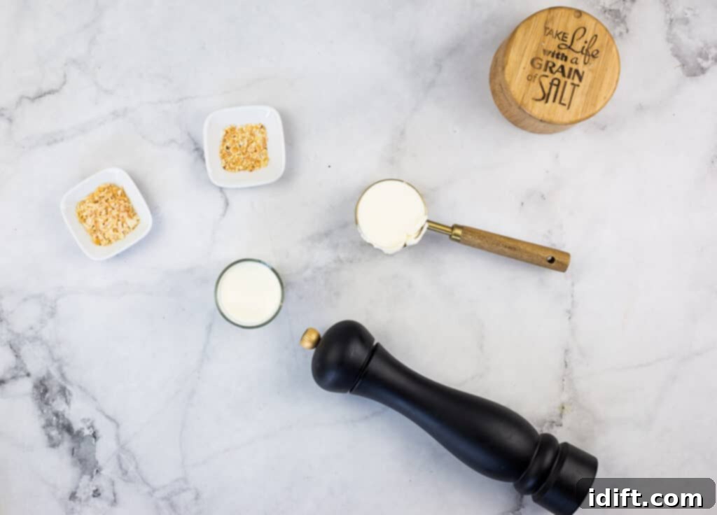 Velvet Mascarpone Spinach Your Ultimate Creamy Side 6 Various ingredients for Creamed Spinach with Mascarpone laid out.