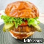 Bacon-Wrapped Burger on a pretzel bun.