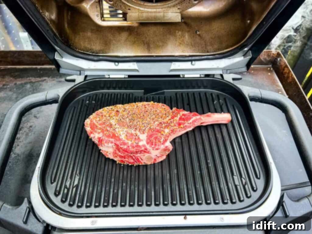Tomahawk steak on the Ninja Woodfire Grill.