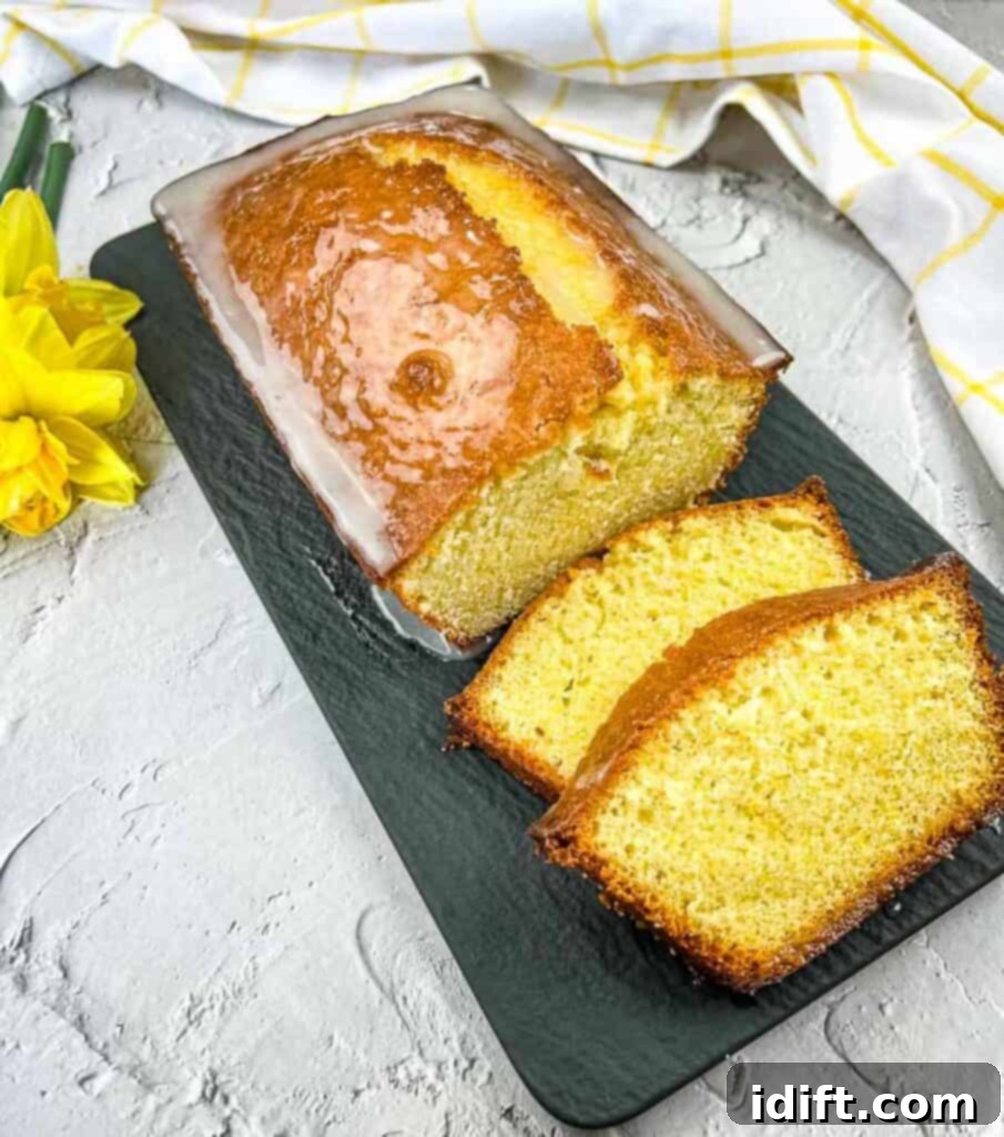 Lemon loaf on a black platter.