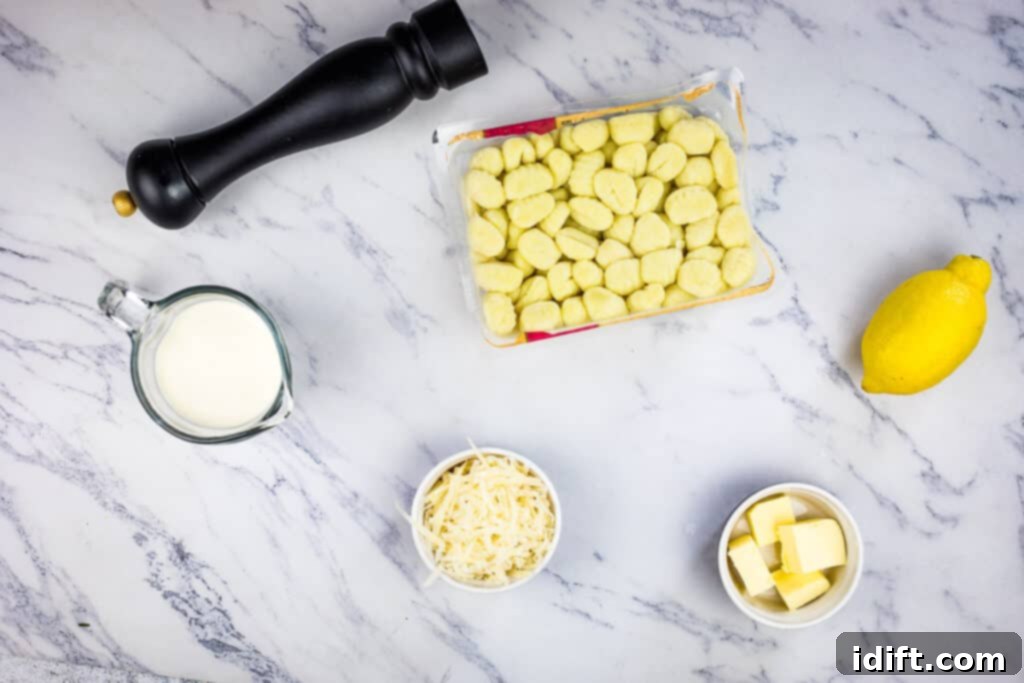 Ingredients for Gnocchi with Lemon Parmesan Sauce laid out on a table.