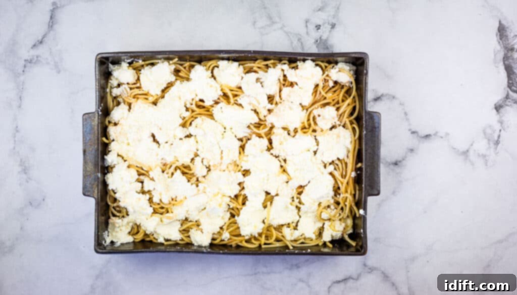 Priceless Pasta Bake 14 A baking dish filled with pasta and cheese.