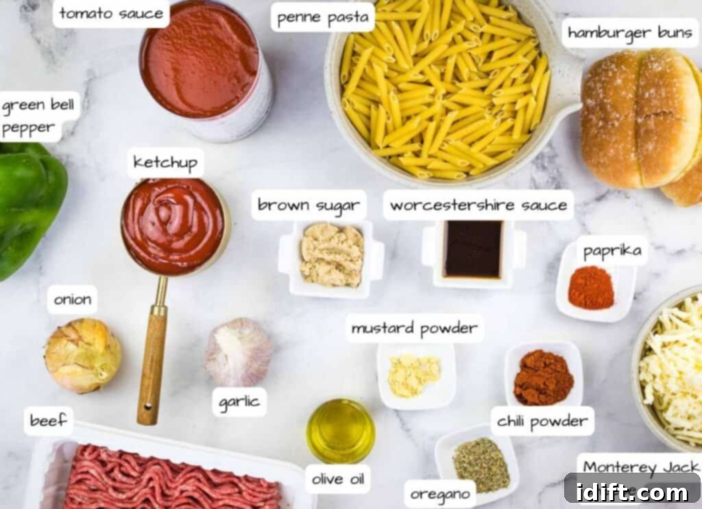 Hearty Sloppy Joe Noodles 4 All the fresh and pantry ingredients for Sloppy Joe Pasta casserole are neatly arranged on a rustic wooden board, ready for preparation.