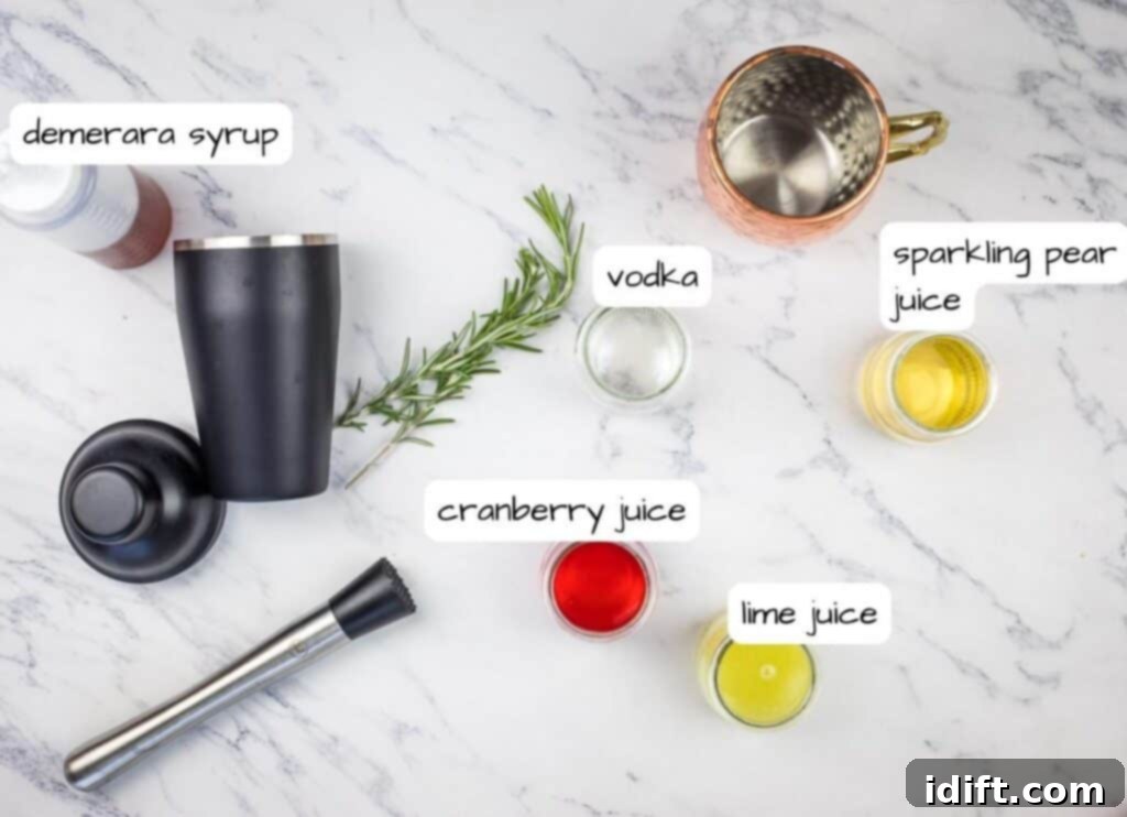 The ingredients for a cocktail are laid out on a marble table.