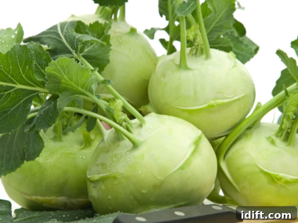 Golden Parmesan Roasted Kohlrabi 4 Several kohlrabi on a counter with a knife in the front.