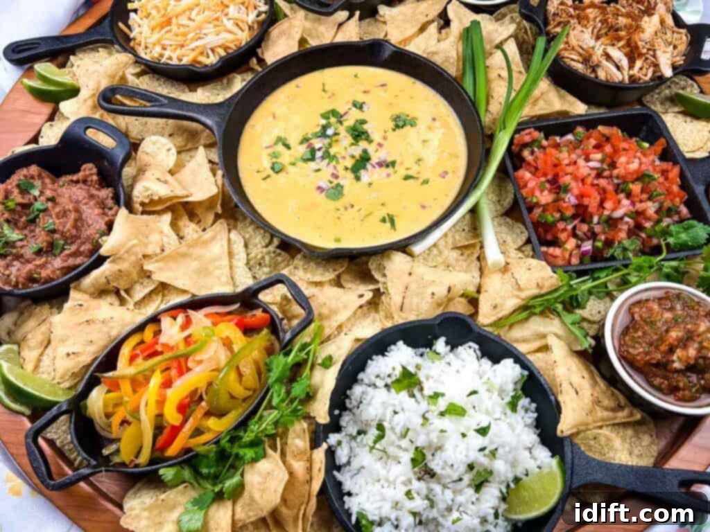 Mega Nacho Spread 5 A stunning platter of Mexican food arranged on a rustic wooden board, ready for sharing and customization.