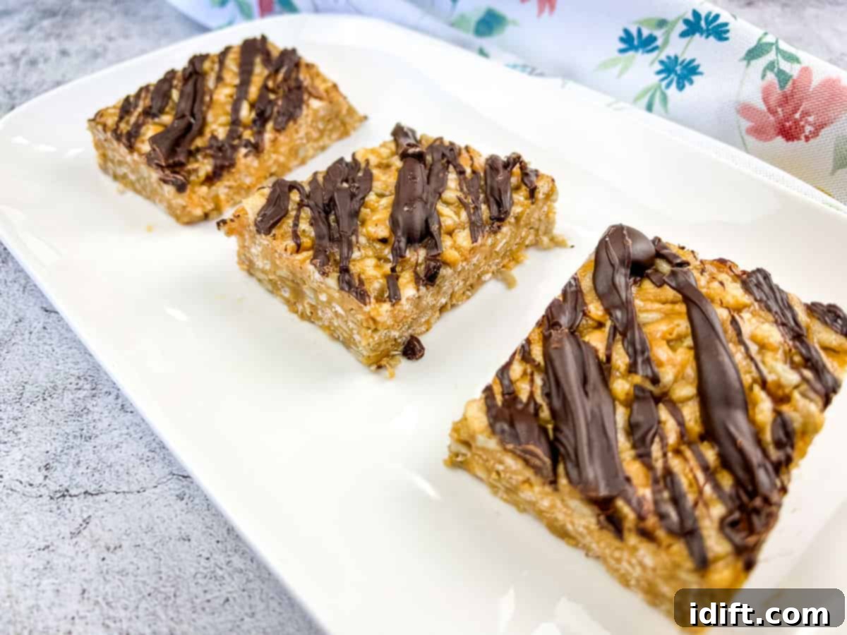 Feeding a Crowd? 11 Recipes That Serve a Multitude 5 Four pieces of molly bars on a white plate.