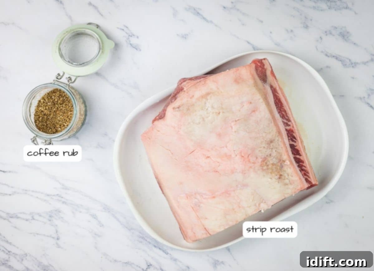 Succulent Traeger Smoked New York Strip Roast 5 A raw New York Strip Roast on a plate, generously coated with the coffee rub, ready for smoking.