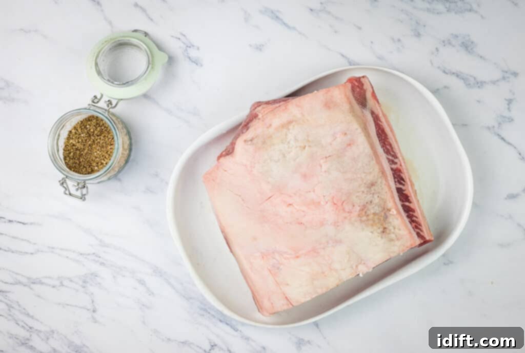 Succulent Traeger Smoked New York Strip Roast 6 All ingredients for the Smoked New York Strip Roast and coffee rub laid out neatly on a white surface.