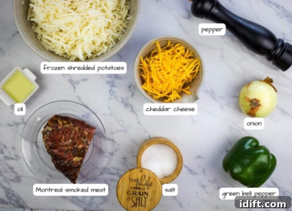 Classic Montreal Smoked Meat Hash 4 The ingredients for a cheesy steak sandwich laid out on a marble table.