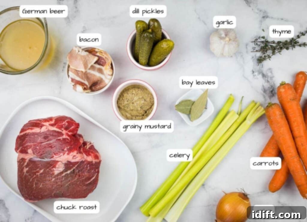 A selection of ingredients for slow cooker German Pot Roast arranged on a marble countertop, including chuck roast, bacon, vegetables, and seasonings.
