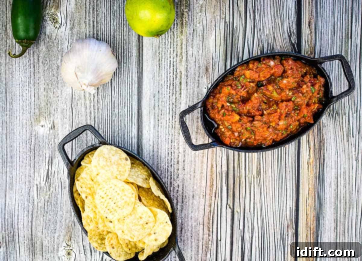 Smoked Tomato Salsa in a black dish.