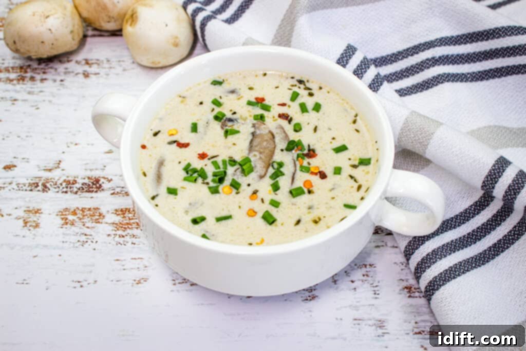 Easy Soups Kids Can Make 2 A low carb white bowl of soup with mushrooms and chives, perfect for an office ready lunch.