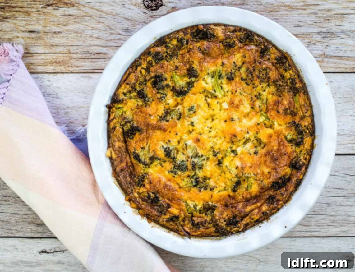 Timeless Tastes: 11 Vintage Recipes for the Modern Kitchen 3 A perfectly baked slice of Broccoli 3-Cheese Impossible Quiche on a white plate, accompanied by a glass of vibrant orange juice.