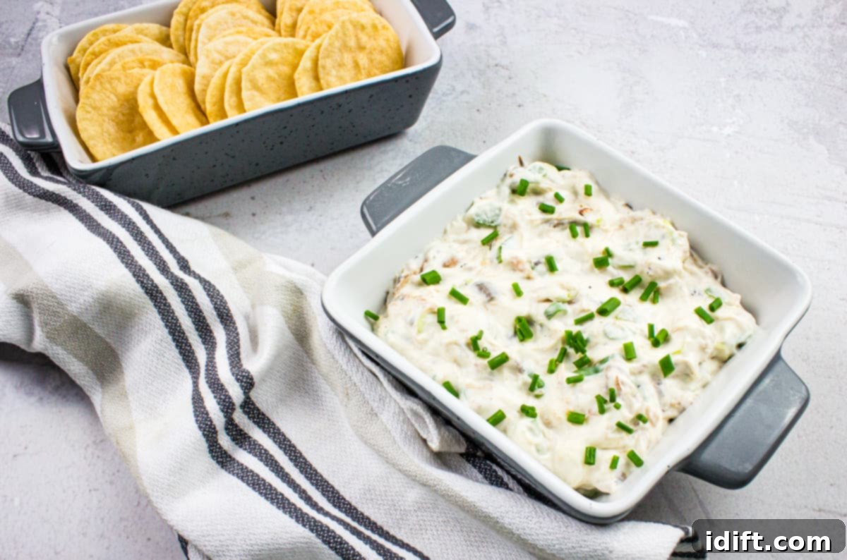 Super Bowl Party MVPs: 15 Recipes That Score Every Time 4 A bowl of cold crab dip with crackers and chives.