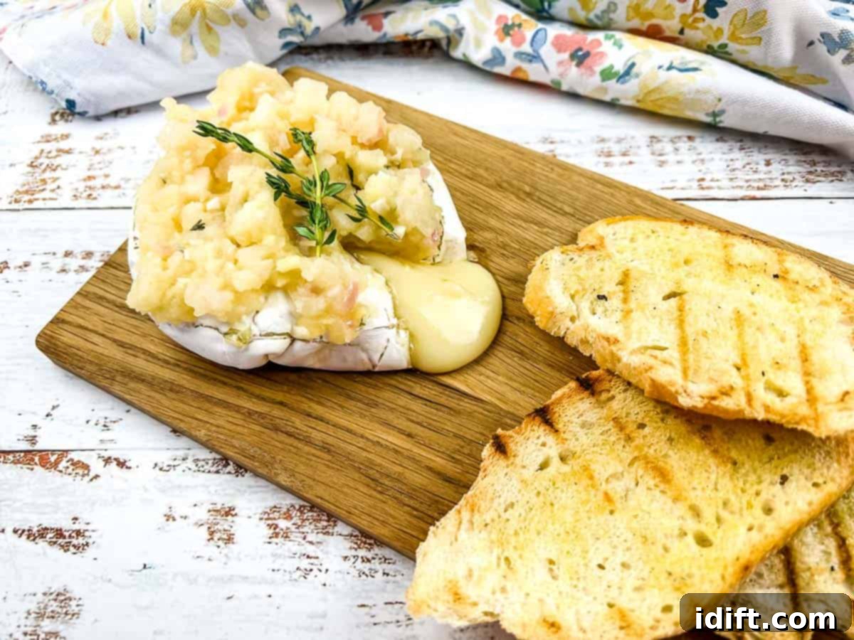 Super Bowl Party MVPs: 15 Recipes That Score Every Time 8 A chunk of oozing brie with apple chutney on a board.