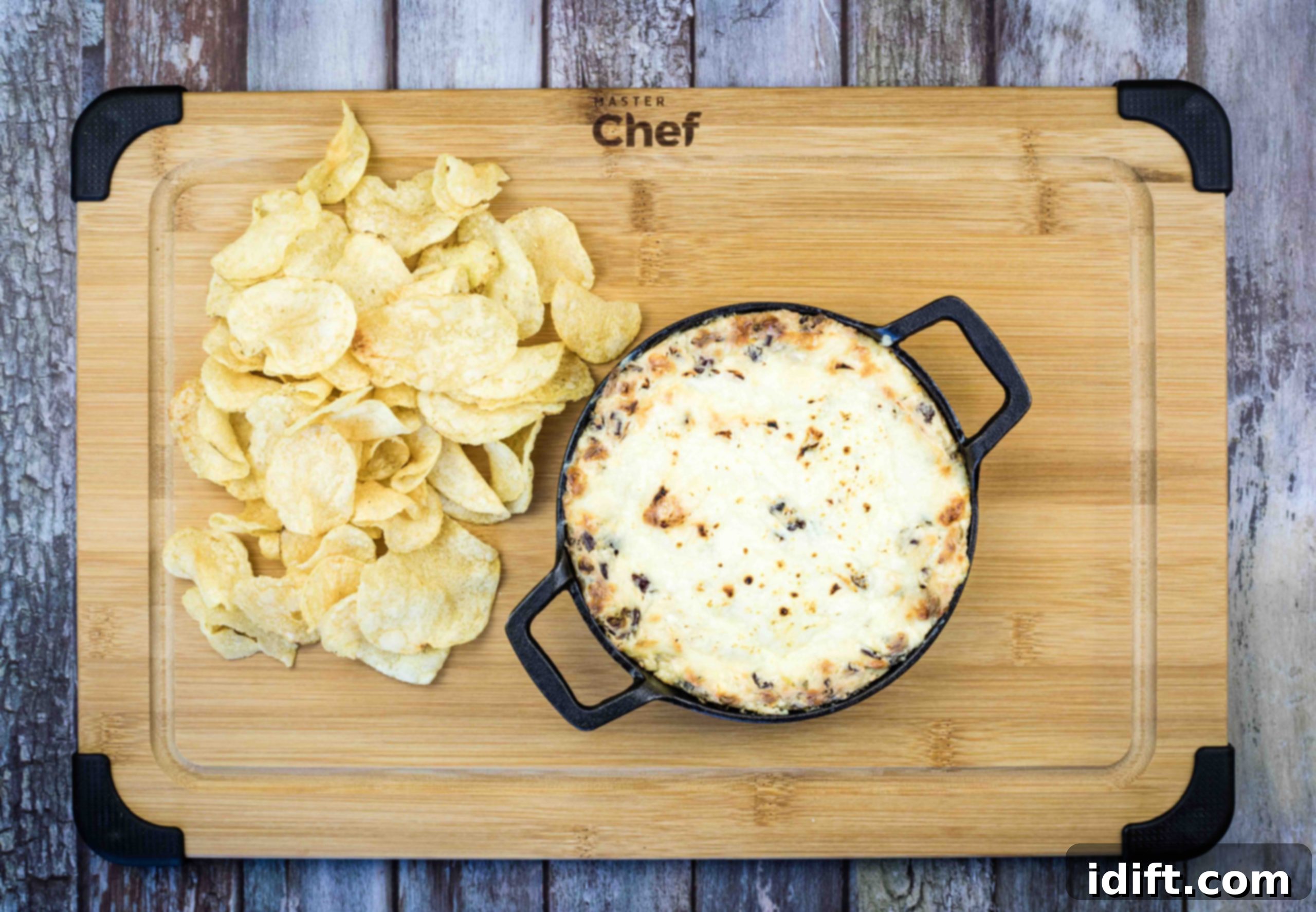 Cheesy Delights That Melt Your Soul 11 Beef jerky dip on a cracker held in a hand.