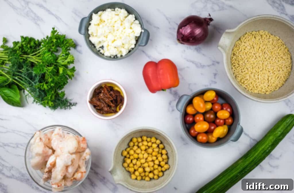 A vibrant collection of fresh ingredients, including plump shrimp, colorful vegetables, and orzo pasta, laid out on a dark surface, ready for the Mediterranean Orzo Salad preparation.