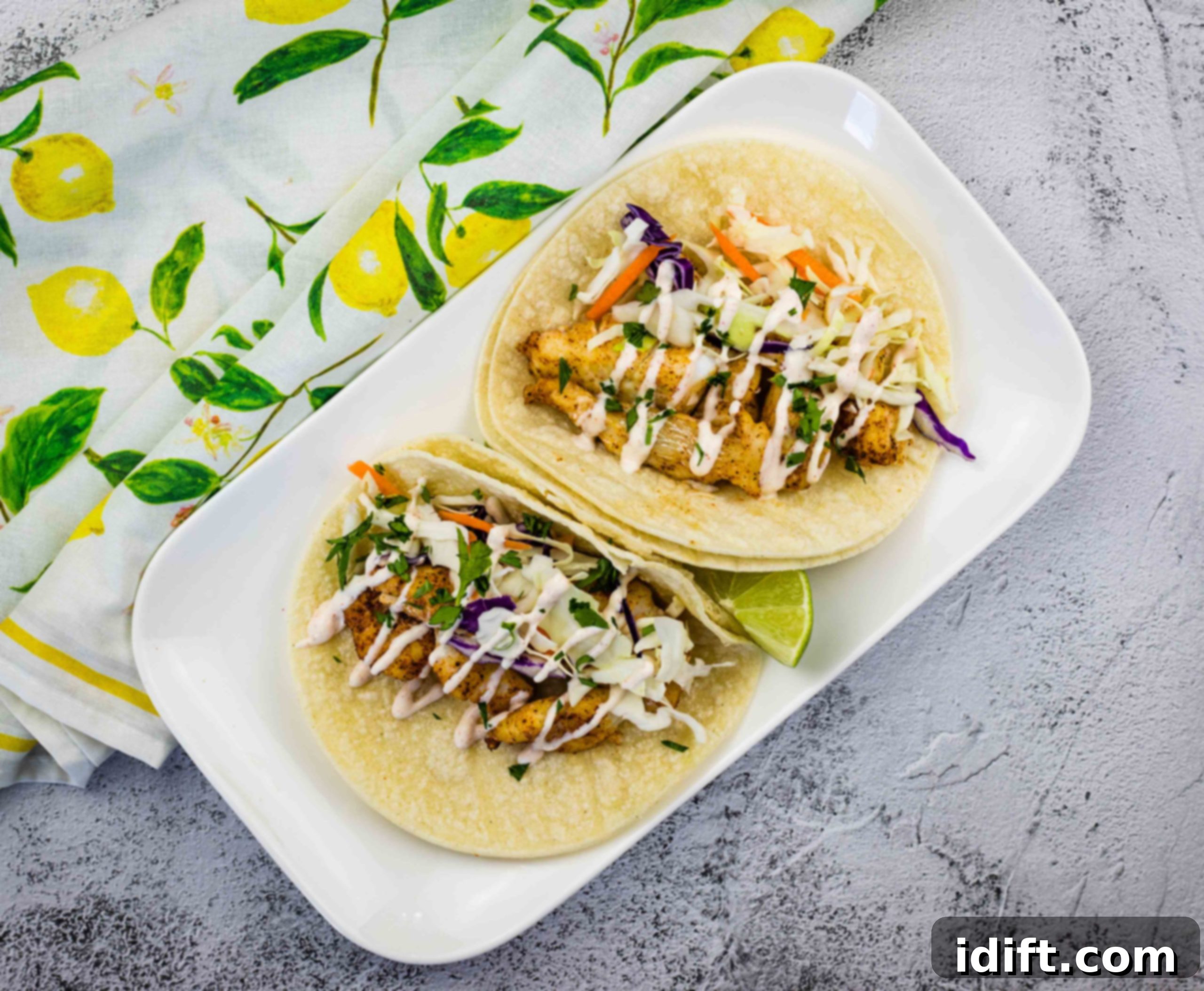 Cook Up Joy: Simple Recipes for Little Kitchen Stars 8 Baja Fish Tacos on a plate.