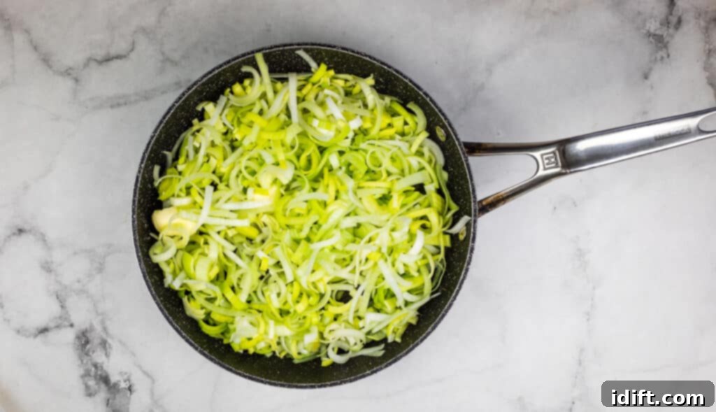 A frying pan filled with leeks.