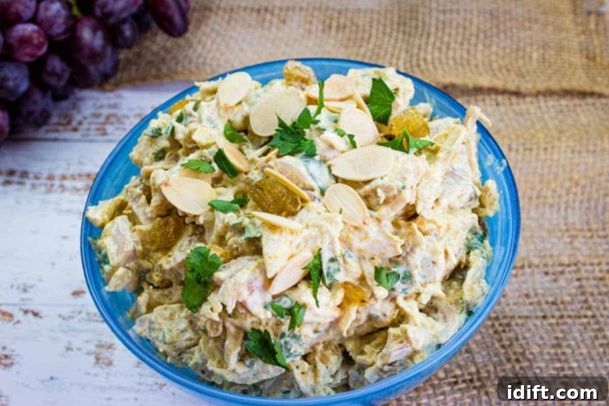 Swimsuit Confidence Boost: 21 Delicious Low-Calorie Dishes 8 Curried chicken salad in a blue bowl.