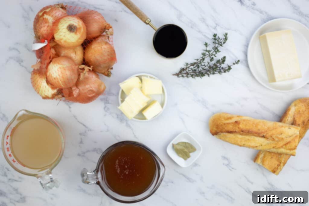 Chef Jenn's Signature French Onion Soup 5 The ingredients for a french onion soup are shown on a marble table.