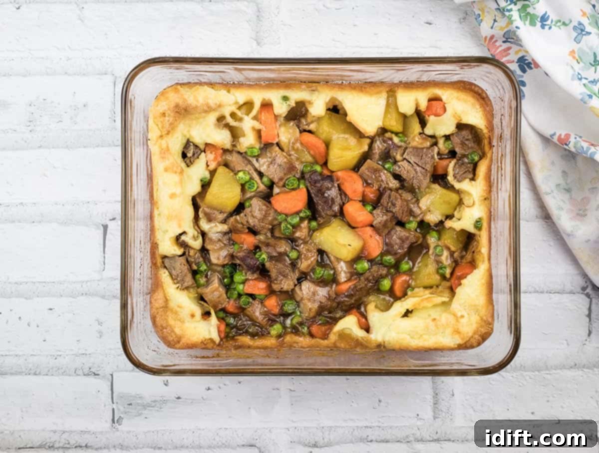 19 Leftover Dishes You'll Seriously Crave 7 Yorkshire pudding pie in a white glass dish.