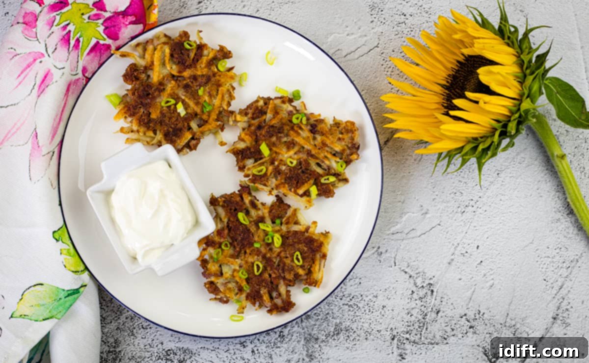 23 Power-Packed Breakfasts to Fuel Your Day 11 Corned beef fritters on a white plate with a sunflower.
