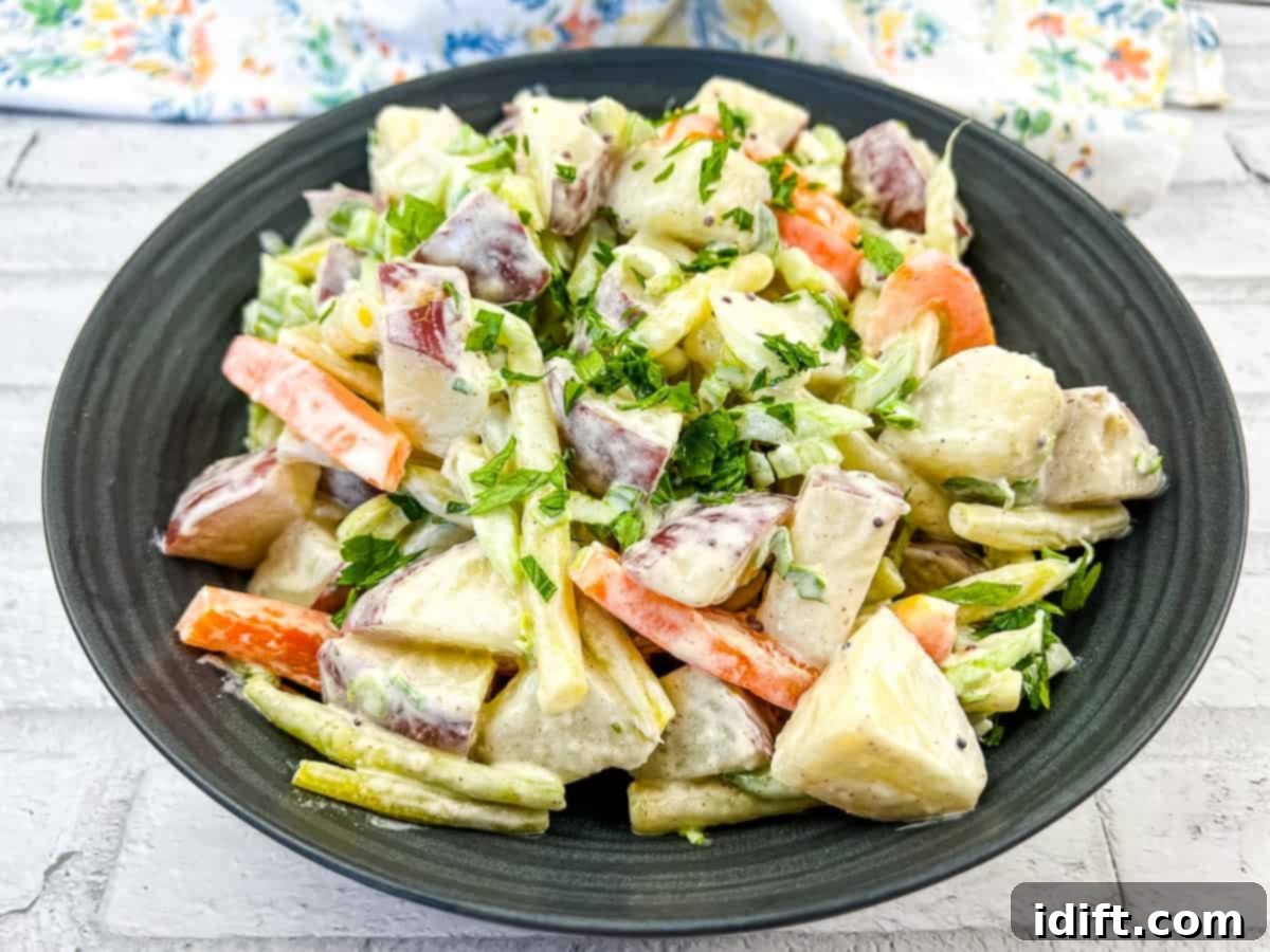 21 Delectable Salads for Effortless Midday Meals 10 A bowl of yellow bean and potato salad.