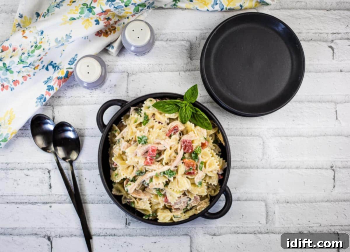 11 Innovative Chicken Cooking Styles Beyond Frying 7 Rotisserie chicken pasta salad in a bowl.