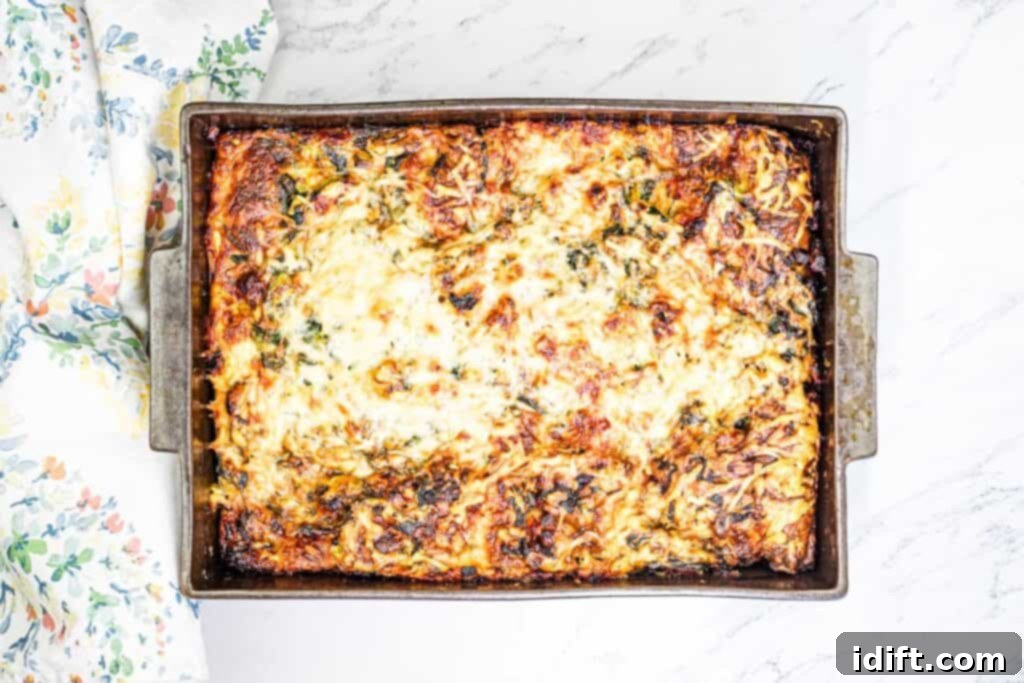 Fluffy Croissant Breakfast Delight 10 Croissant Breakfast Casserole in a baking dish.