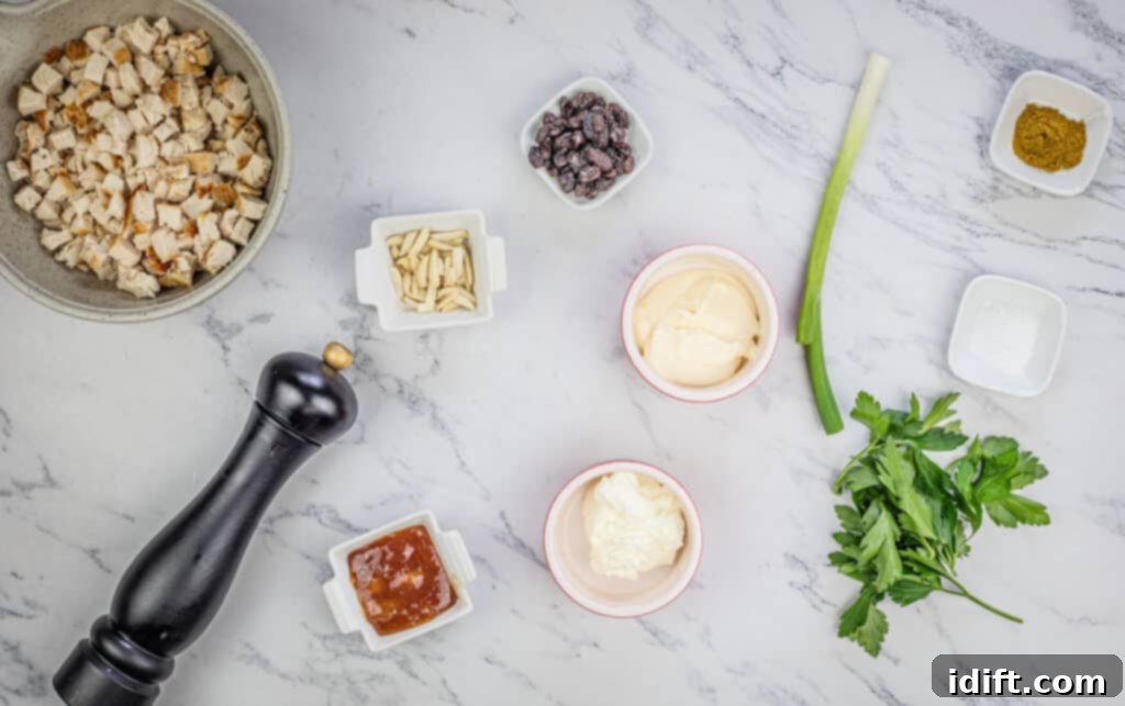 Regal Curried Chicken Salad 5 The ingredients for coronation chicken salad on a marble table.