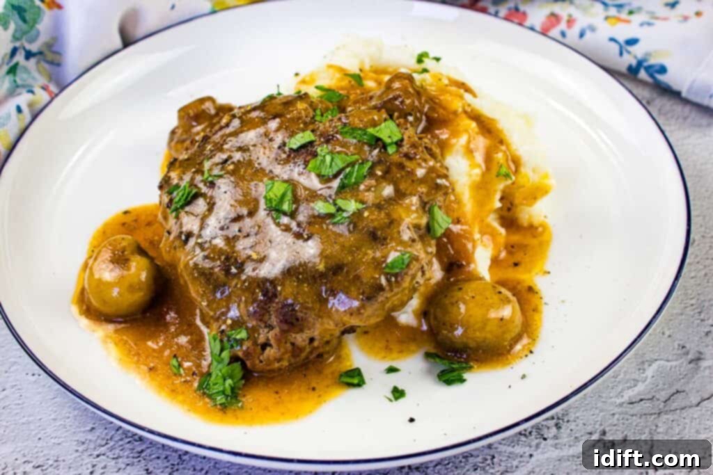 Ground Beef Your Weeknight Hero 13 Easy Dinners 2 Salisbury Steak with gravy on mashed cauliflower.