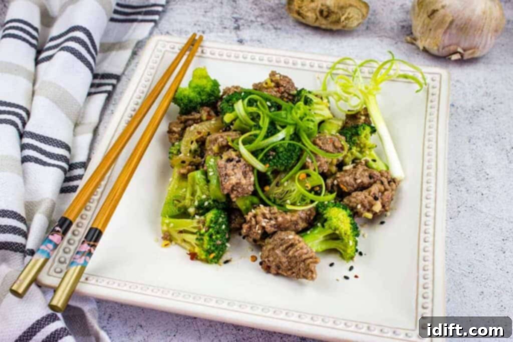 11 Low-Carb Treats: Big Flavor, No Guilt 2 A plate of savory ground beef and crisp broccoli, elegantly arranged with chopsticks, ready to be enjoyed.