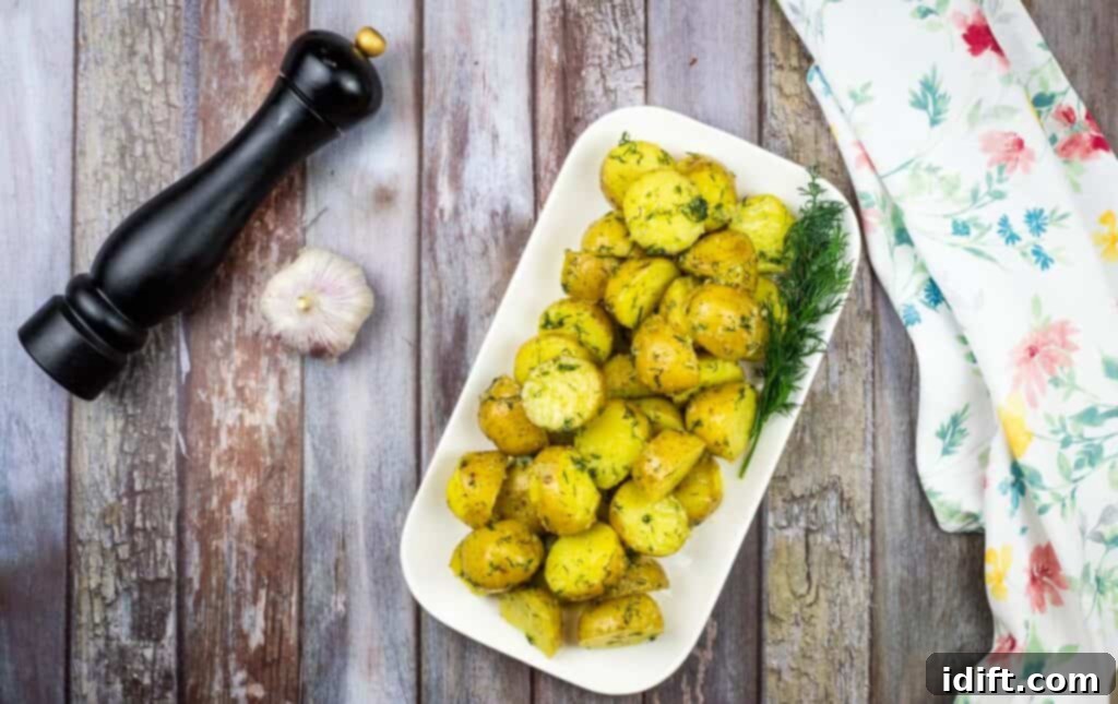 A generous serving of hearty Ukrainian Potatoes, featuring perfectly roasted and seasoned potato chunks with fresh herbs and spices, making for a truly flavorful and comforting side dish.