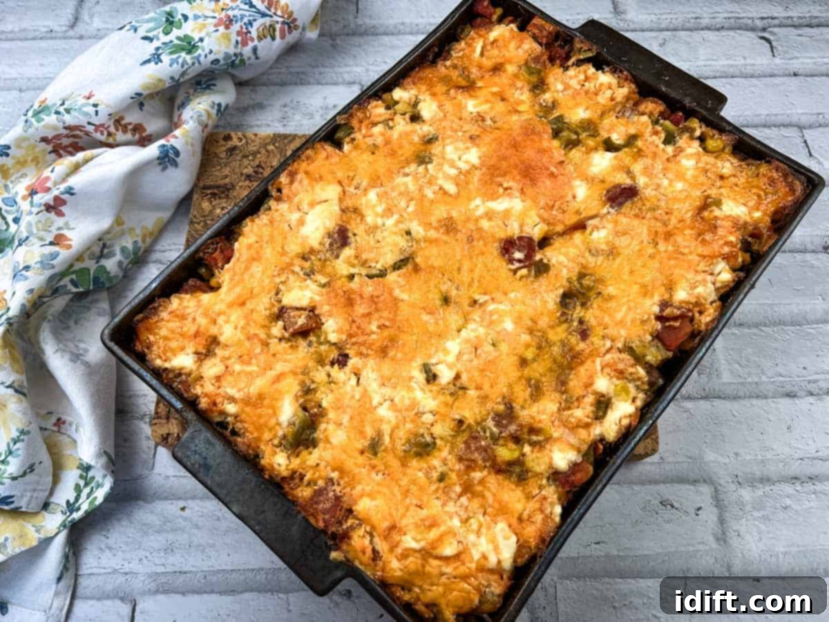 A generous slice of savory Beefy John Wayne Casserole served on a white plate.