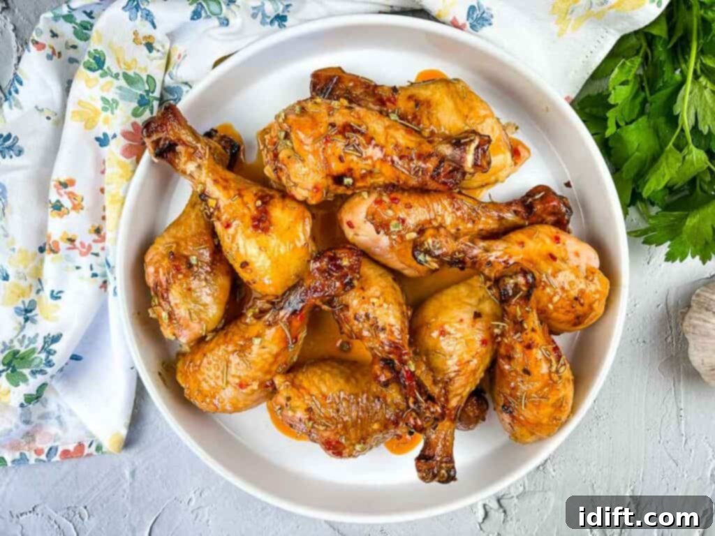A plate of glazed chicken legs.