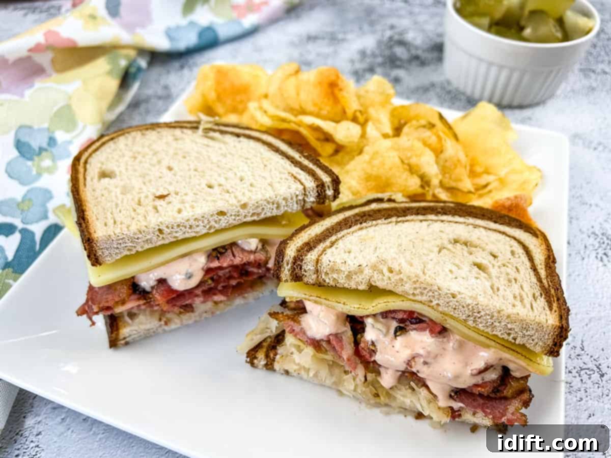 13 Easy Dinners That Taste Gourmet 5 A classic Pastrami Reuben sandwich, perfectly grilled with melted cheese and sauerkraut, served with pickles and chips.