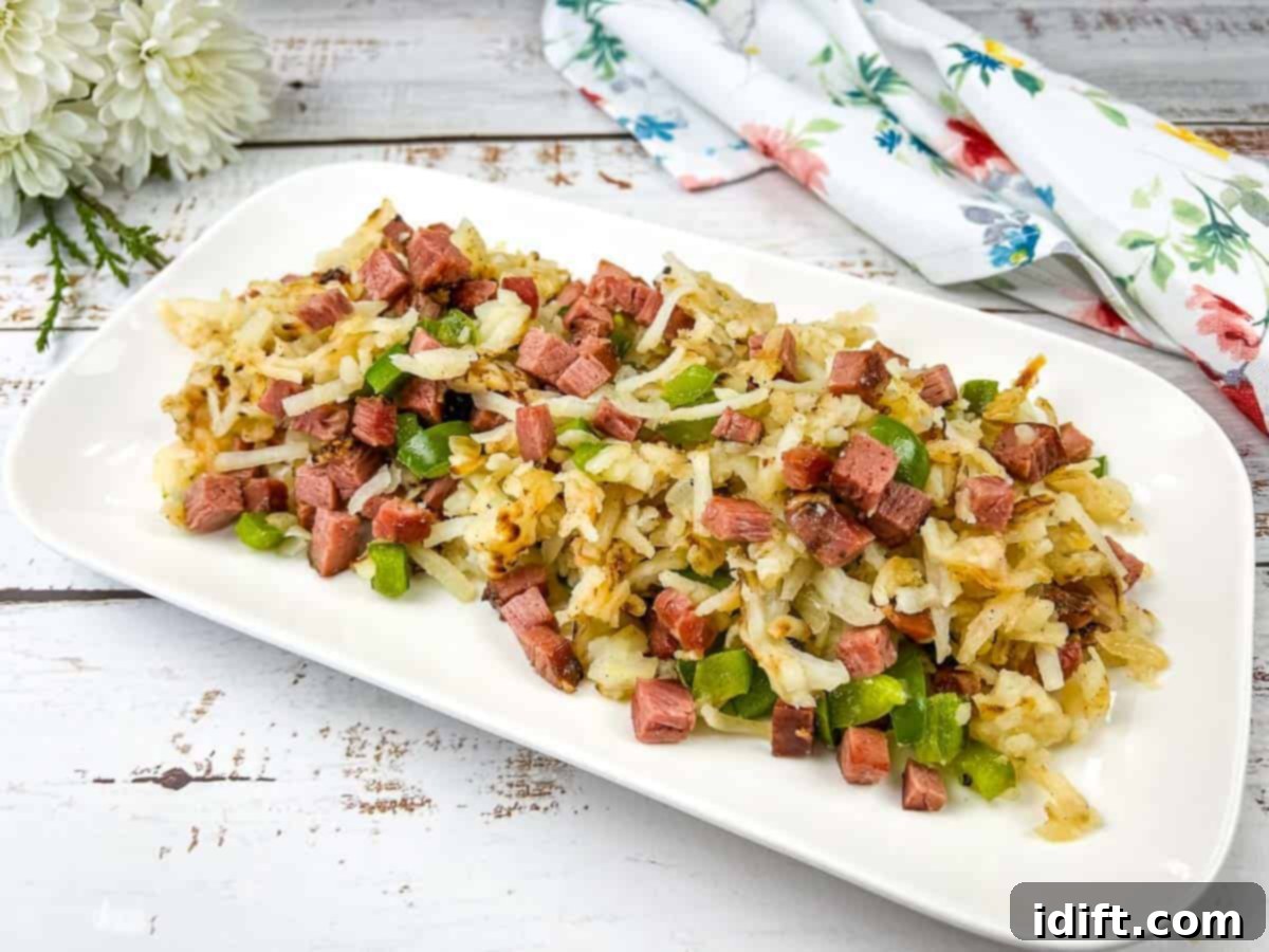 9 Canadian Classics: More Than Maple Syrup 5 A white plate with Montreal smoked meat hash on it.