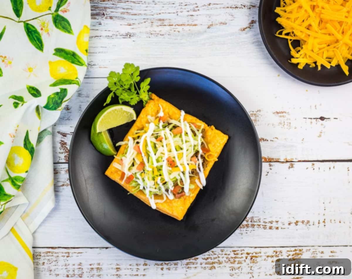 15 Quick Family Favorites for Busy Nights 4 A top-down shot of a Cheez-Its Tostada with crackers and a bottle of hot sauce.