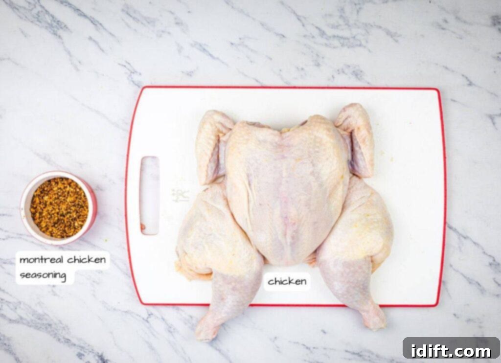 A raw chicken alongside montreal chicken seasoning on a white countertop.
