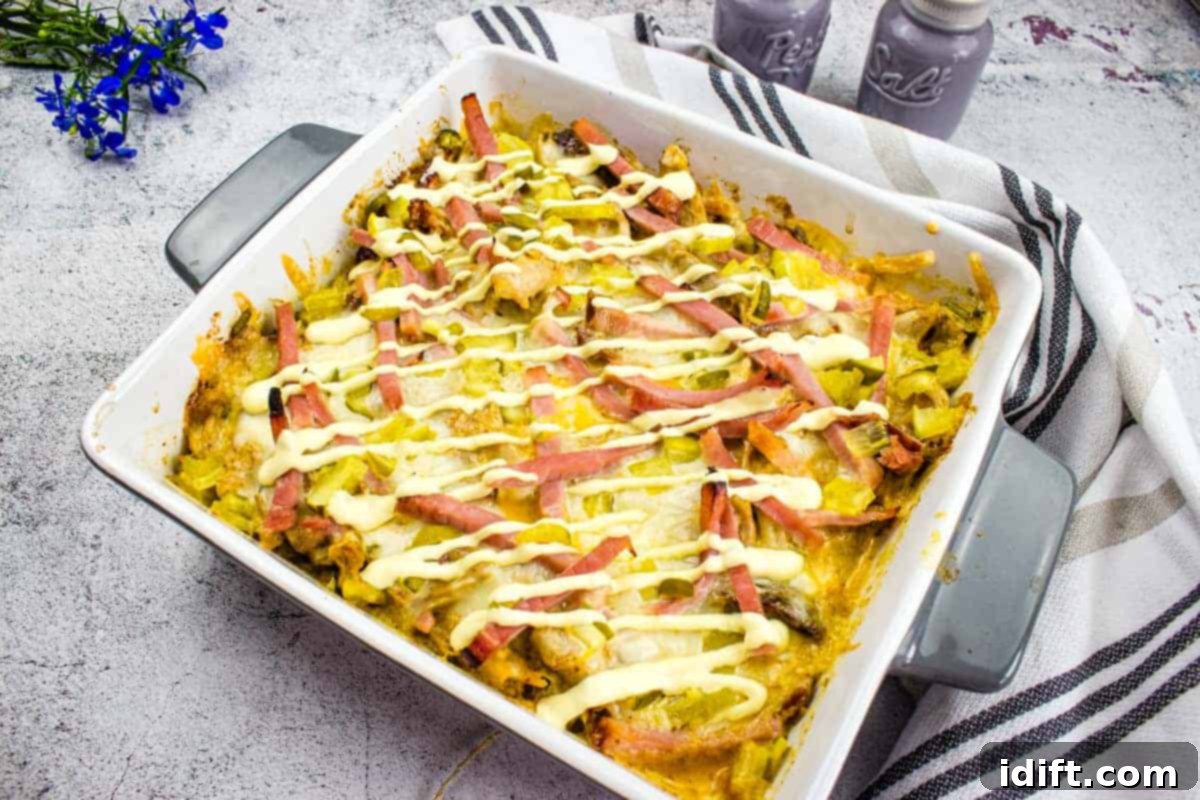 15 Stylish Casseroles That Redefine Comfort Food 7 A closeup shot of Cuban Casserole in a baking dish, brimming with vibrant, savory flavors.