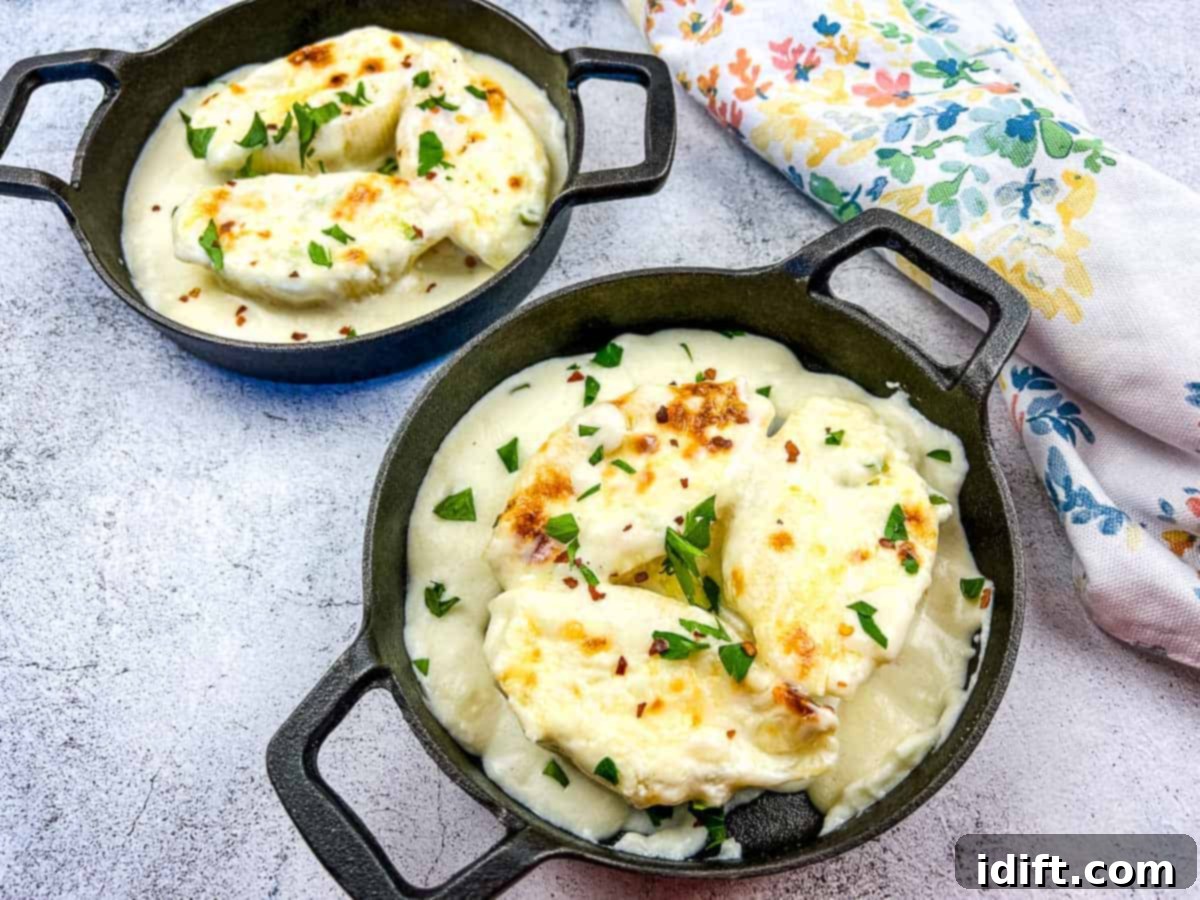 15 Global Cuisines That Will Transform Your Palate 8 Giant Cheese Stuffed Pasta Shells in two black serving dishes.