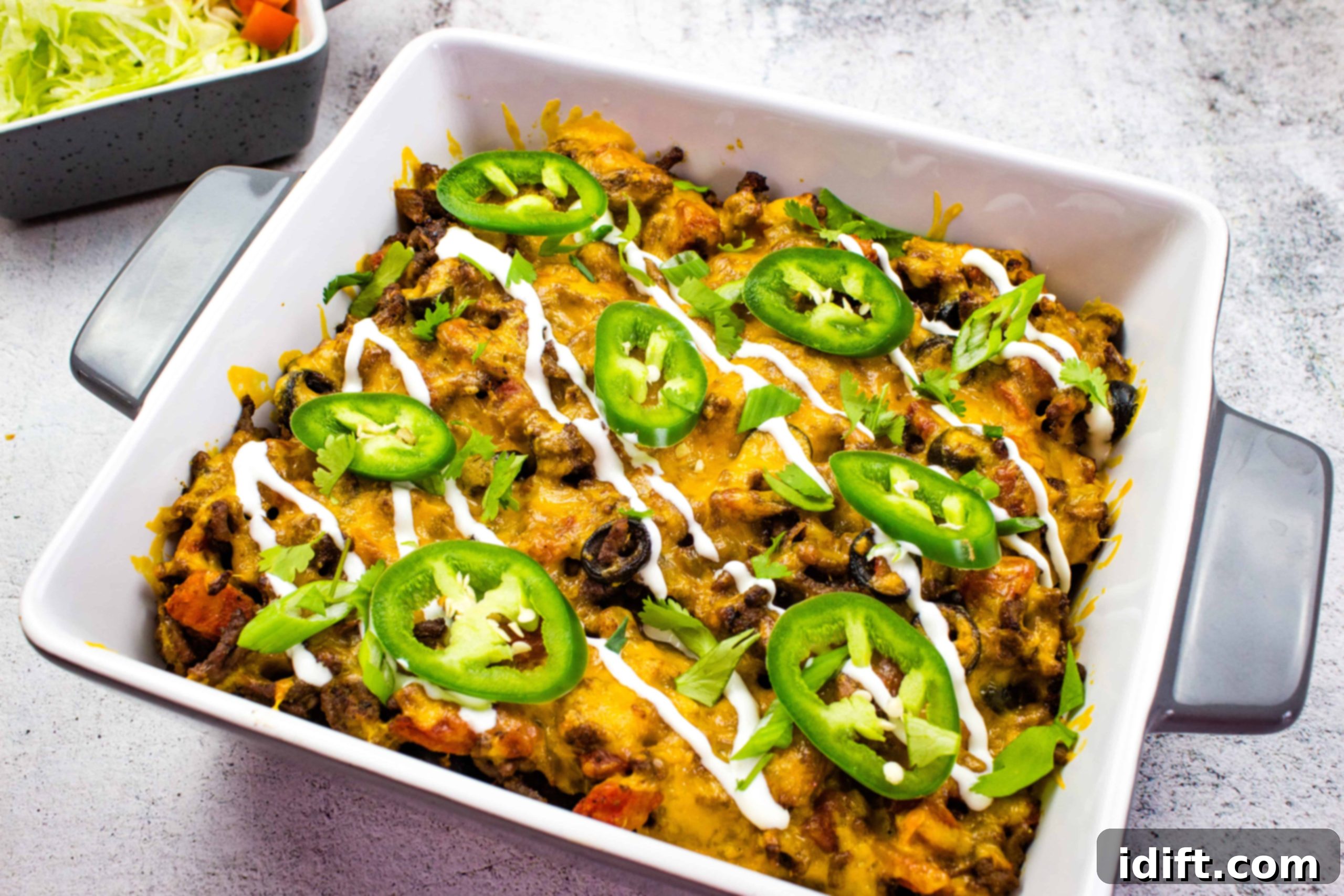 A Taco Casserole dish with black beans, cheese and jalapenos.
