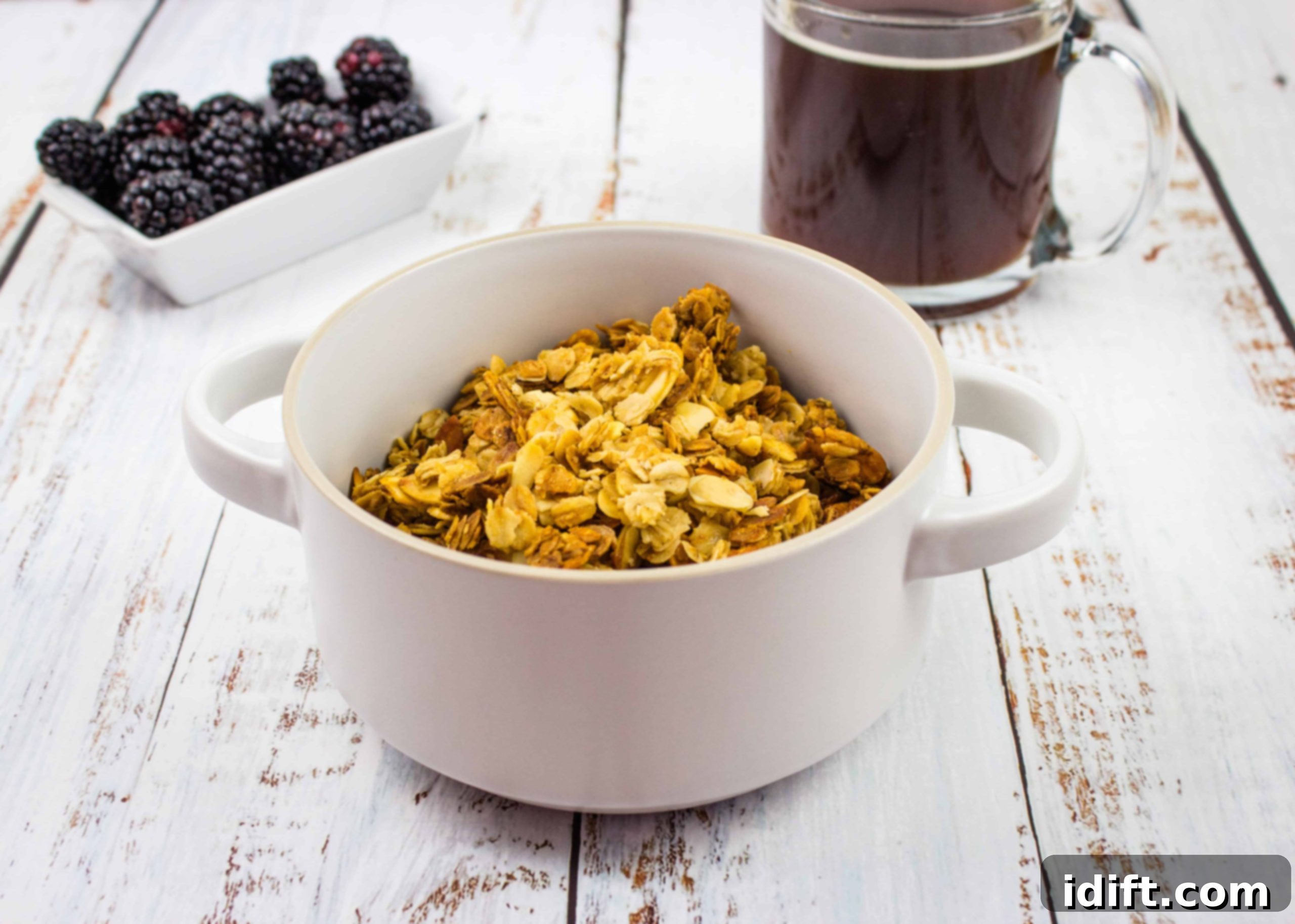 15 Breakfasts With Zero Dish Cleanup 3 Honey Almond Granola in a white bowl.