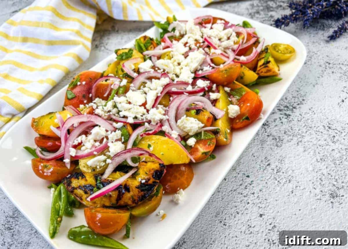 15 Grilled Meats Your Taste Buds Will Thank You For 7 A plate with Grilled Peach Salad with Tomatoes.