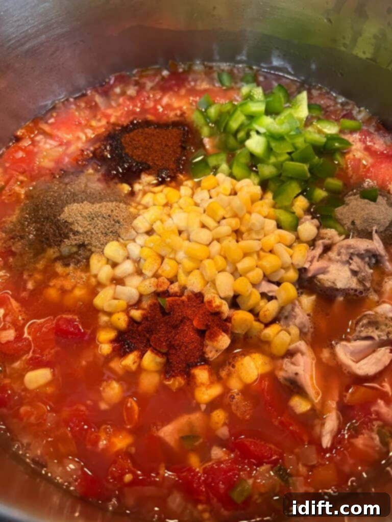 Southwestern Turkey Tortilla Soup 7 Adding remaining ingredients to the soup pot.