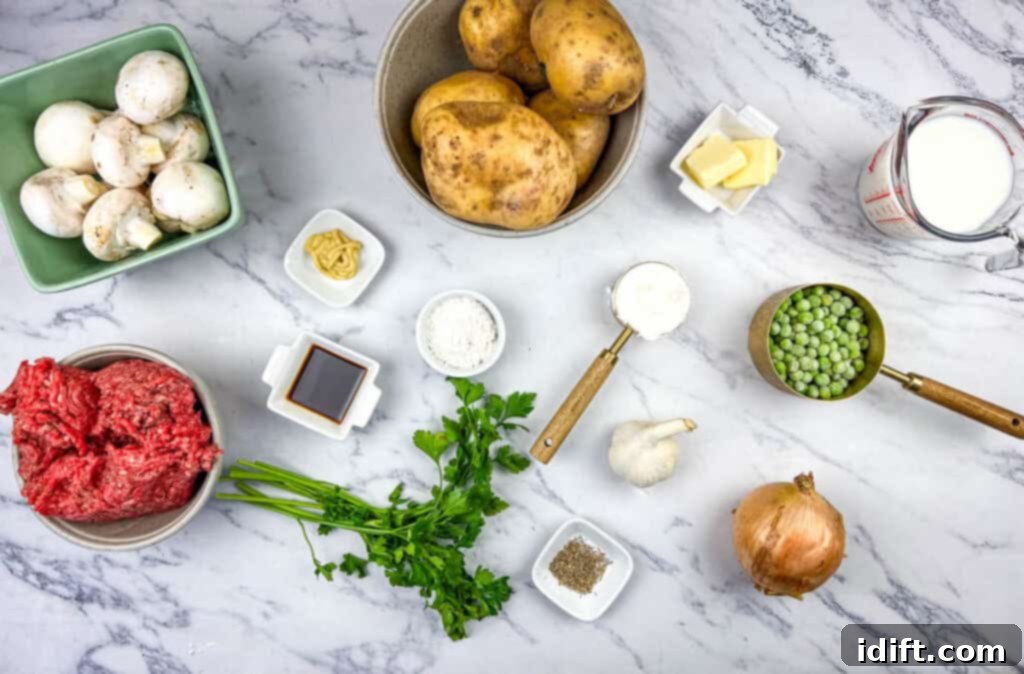 Fresh ingredients laid out on a kitchen counter for making Skillet Stroganoff Pie.