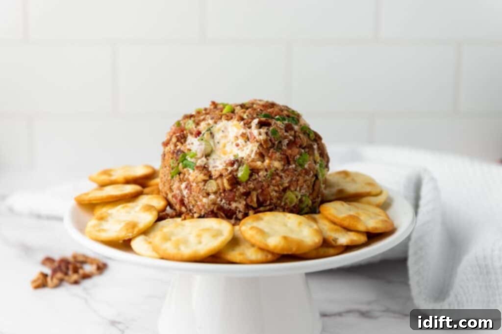 Pecan Bacon Cheeseball with crackers around.